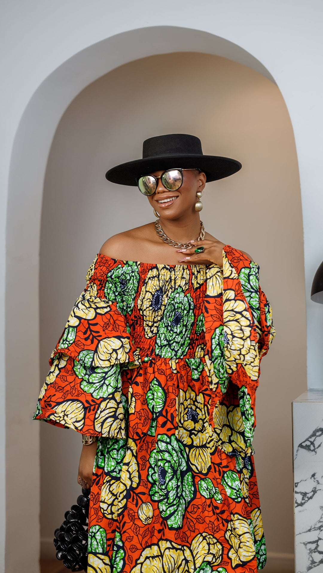BISI AFRICAN PRINT SMOCKED OFF SHOULDER MIDI DRESS [ORANGE]