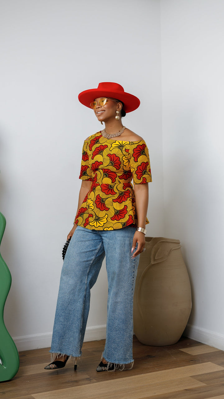 IMARA AFRICAN PRINT ASYMMETRIC PEPLUM TOP [ORANGE]