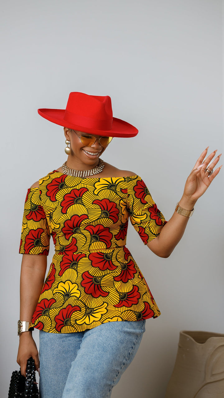 IMARA AFRICAN PRINT ASYMMETRIC PEPLUM TOP [ORANGE]